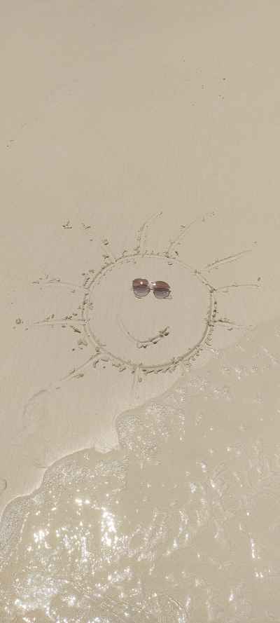 Smiley Face Drawn on Alexandria Beach Sand