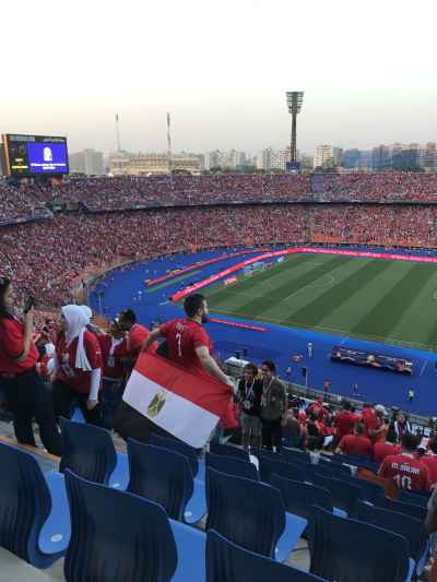 Egyptian Fans Waving Flag at Packed Cairo Stadium