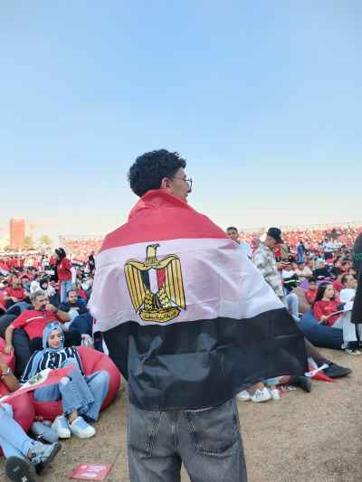 Egyptian Fan Draped in Flag at Fan Zone Cairo