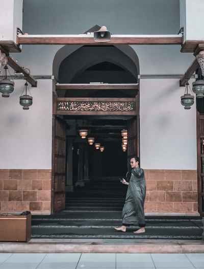 Man Exiting Al-Azhar Mosque Entrance, Cairo