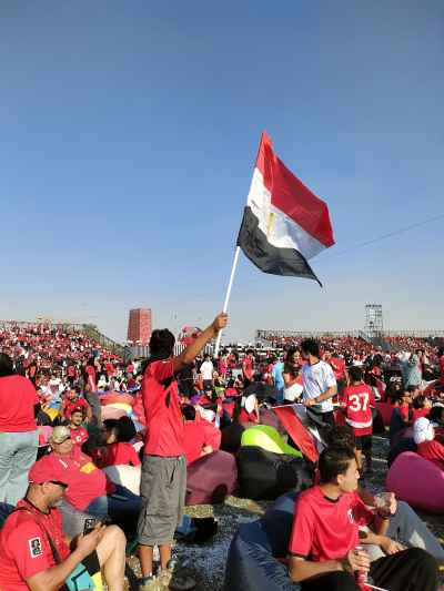 Egyptian Fan Waves Flag at Fan Zone Cairo