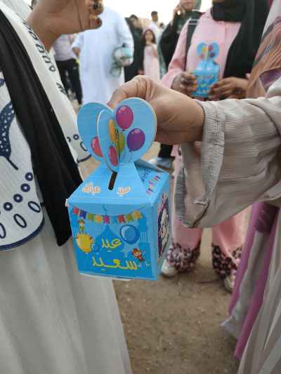Children Receiving Eid Gifts After Eid Prayer at a Mosque in 6 October City