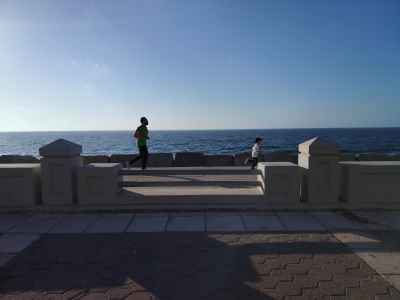 Father and Child Racing on Alexandria Corniche