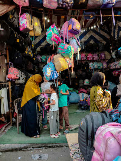 Mother and Children Shopping for School Bags, Cairo Market