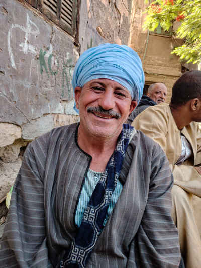 Smiling Upper Egyptian Livestock Seller in a Traditional Market
