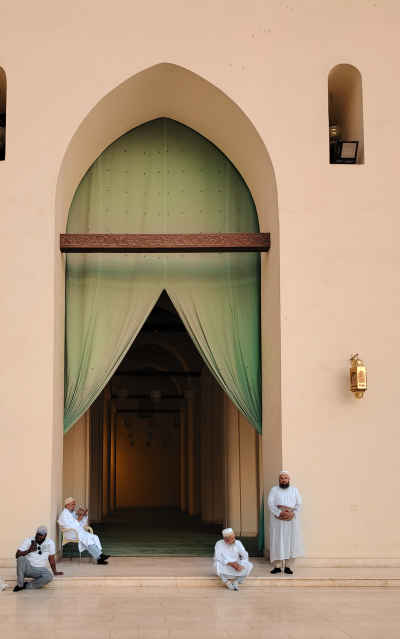 Waiting for Prayer at Al-Hakim Mosque