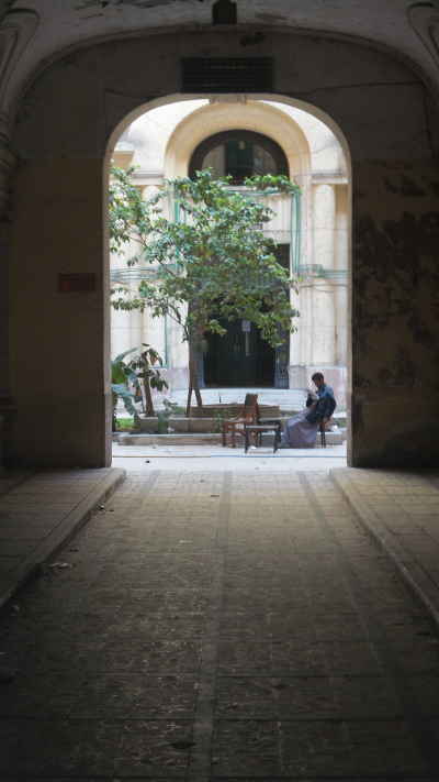 Building Guard Reading Newspaper, Wust El-Balad Cairo