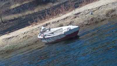 Small Wooden Boat Moored on Nile Shore, Aswan