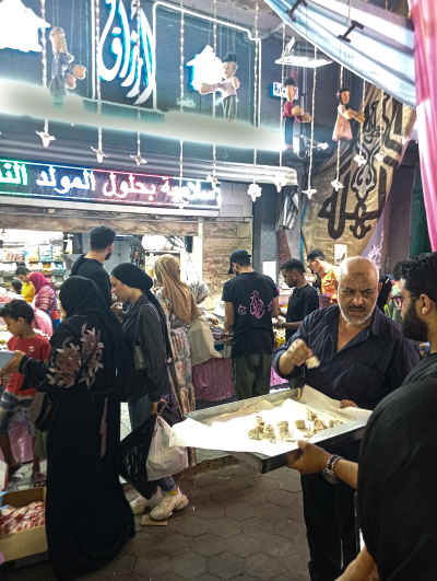 Street Vendor Offering Malban Samples, Ramsis Cairo