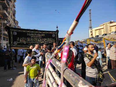 Sufi Procession Illuminated by Festival Lights