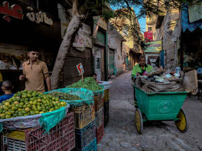 Lemon Vendor and Street Cleaner, Batneya Market Cairo