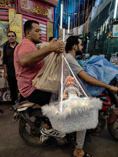 Moulid El-Nabi Bride Doll Carried on Motorcycle, Cairo