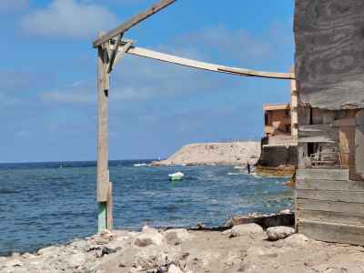 Fisherman at Rocky Alexandria Shoreline, Ras El Tin