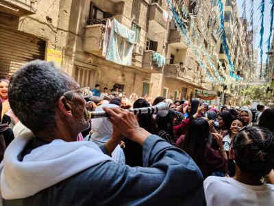 Mizmار Player Performs in Cairo Alley Celebration