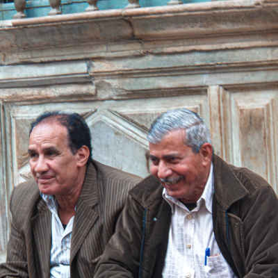 Two Men Laughing Together, Al-Muizz Cairo Winter