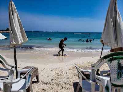 Young Man Playing Football on Marsa Matruh Beach