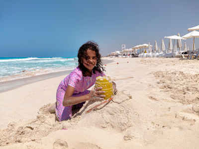 Young Woman With Drink on El Alamein Beach Egypt