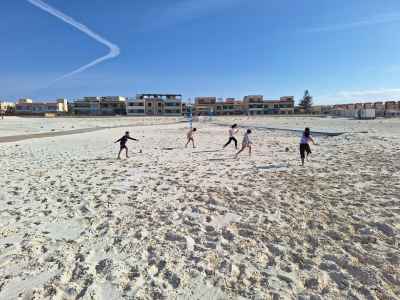 Children Playing Football on North Coast Beach Egypt