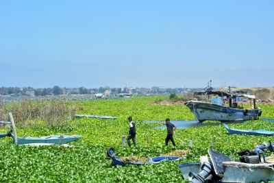 Fishermen Walking Among Boats, Lake Rashid Egypt