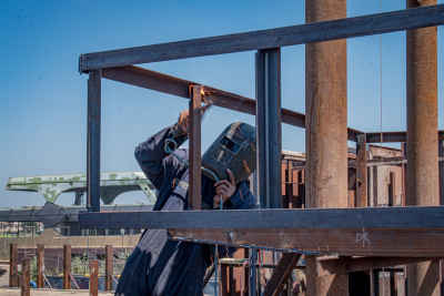 Welder Working on Steel Ship Frame, Rashid Shipyard