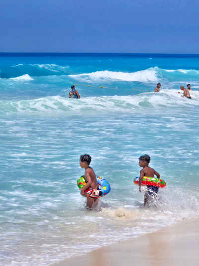 Children Playing in Waves, Island Beach Village Al-Alamein
