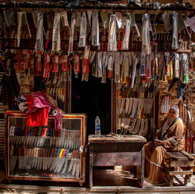Traditional Knife Sharpener Shop with Hanging Knives in Old Maadi