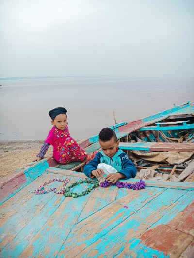 Children Playing on Old Boat, Lake Qarun Fayyum