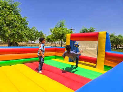 Football Fun Inside an Inflatable Playground