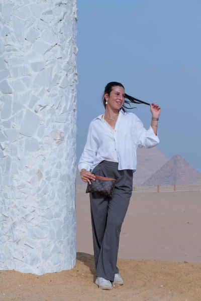 Woman Posing Near Giza Pyramids, Egypt