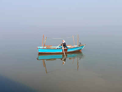 Fisherman on Blue Boat, Lake Qarun Fayyum