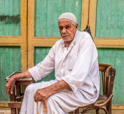 Elder Man in Galabiya with Misbaha, Rashid Streets