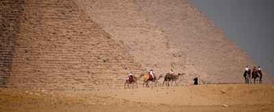 Camel Riders at Giza Pyramids, Egypt