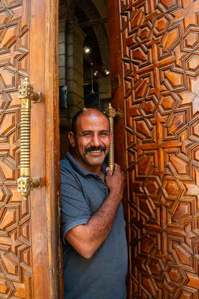 Church Attendant at Carved Wooden Door, Mari Girgis Cairo