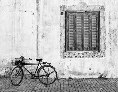 Old Bicycle Parked by Weathered Wall, Rashid