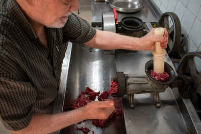 Traditional Egyptian Butcher Preparing Fresh Minced Meat in Old Cairo