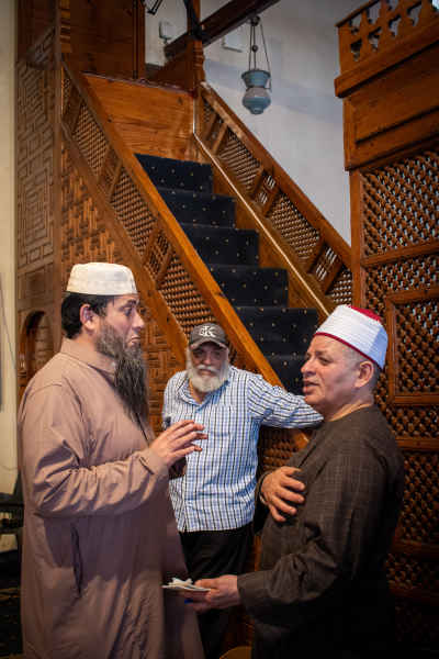 Islamic Scholars Conversing Inside Cairo Mosque