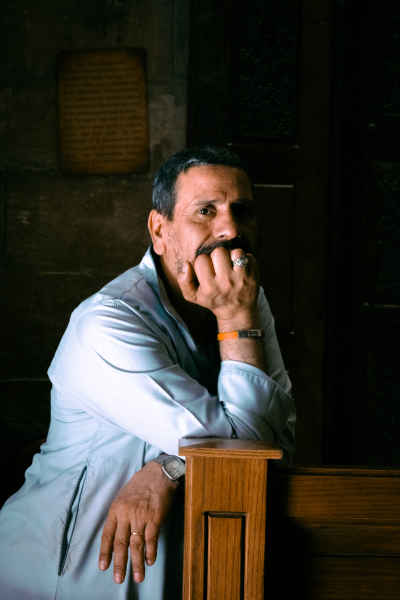 Church Attendant Seated Inside Mar Girgis Monastery Cairo