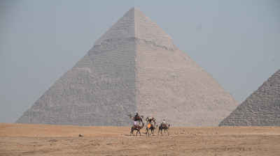 Camel Riders at Giza Pyramids, Egypt