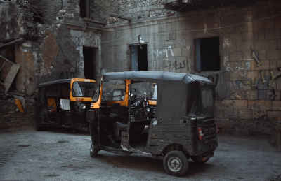 Tuk-Tuk Vehicles Parked in Old Cairo Alley