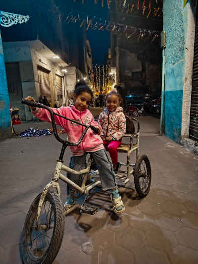 Children Playing on Tricycle During Ramadan, Abdin Cairo