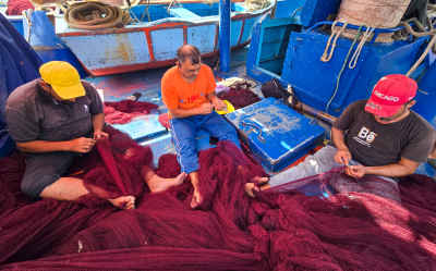 Fishermen Mending Nets on Boat, Rashid Egypt