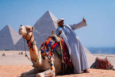 Camel Handler at Giza Pyramids, Egypt