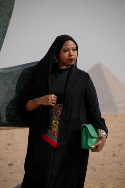 Egyptian Woman at Giza Pyramids Plateau