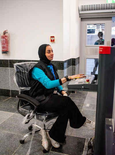 Female Security Officer at Monorail Baggage Scanner, Egypt