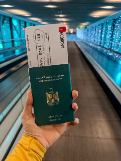 Egyptian Passport with Emirates Boarding Pass, Cairo Airport