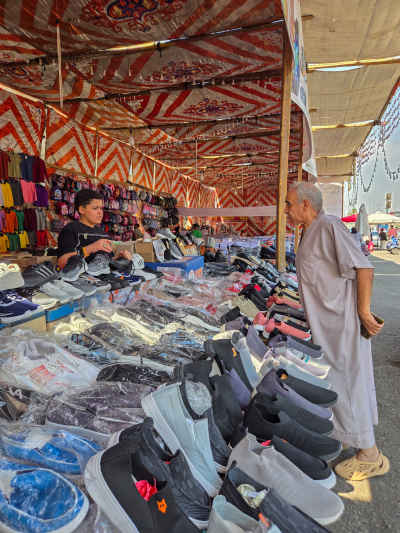 Street Vendor Selling Shoes and School Supplies, Al-Abbaseya