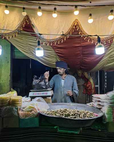 Nut Vendor Stall at Moulid Al-Nabi, Luxor