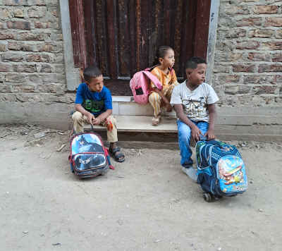 Egyptian School Children Waiting with Backpacks, Qena