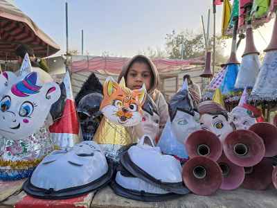 Girl with Carnival Masks and Costumes, Moulid Festival Qena