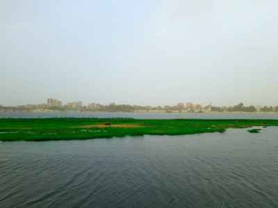 Nile River Green Island and Qena City Riverbank